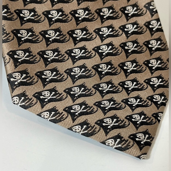 Official Disney Pirates of the Carribean Brown Tie with Skull Flag Pattern - Picture 3 of 7